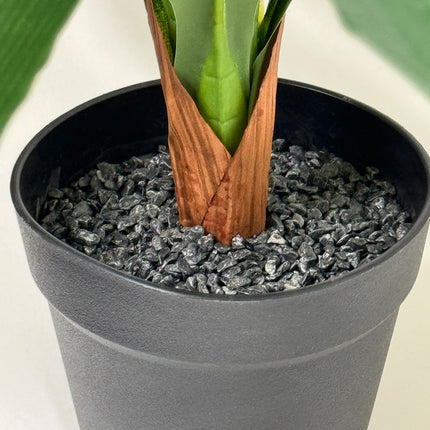 Artificial plant in black colour pot