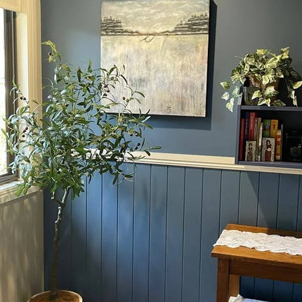 Artificial Olive Tree in white pot in the corner